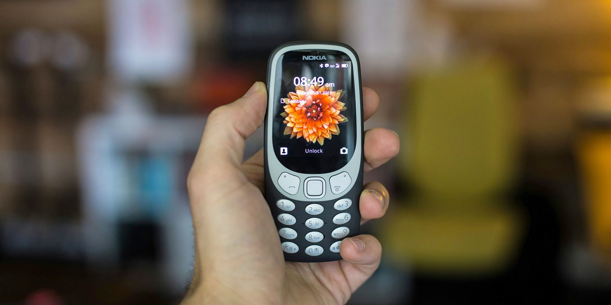 Here's how to turn any iPhone into a dumb phone for you or your kids | Nokia feature phone shown